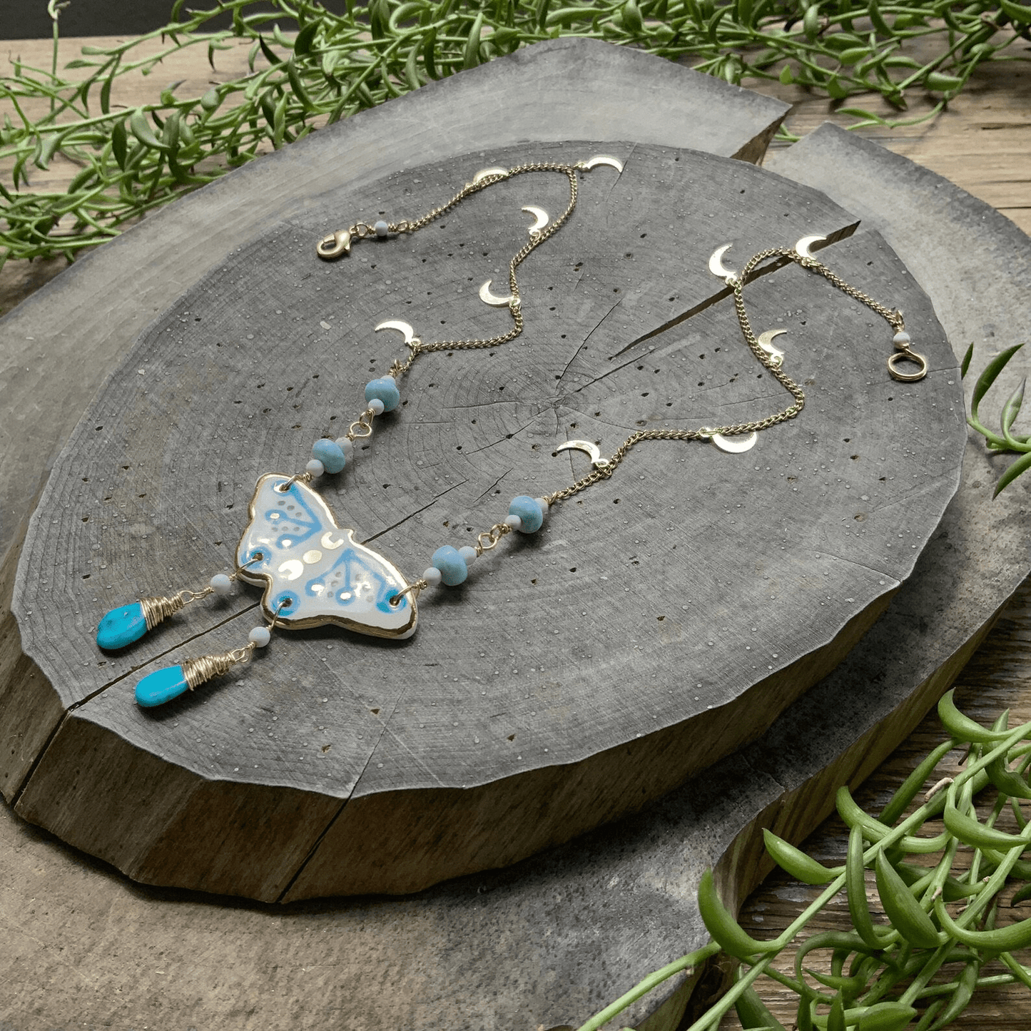 Celestial ceramic moth and larimar necklace