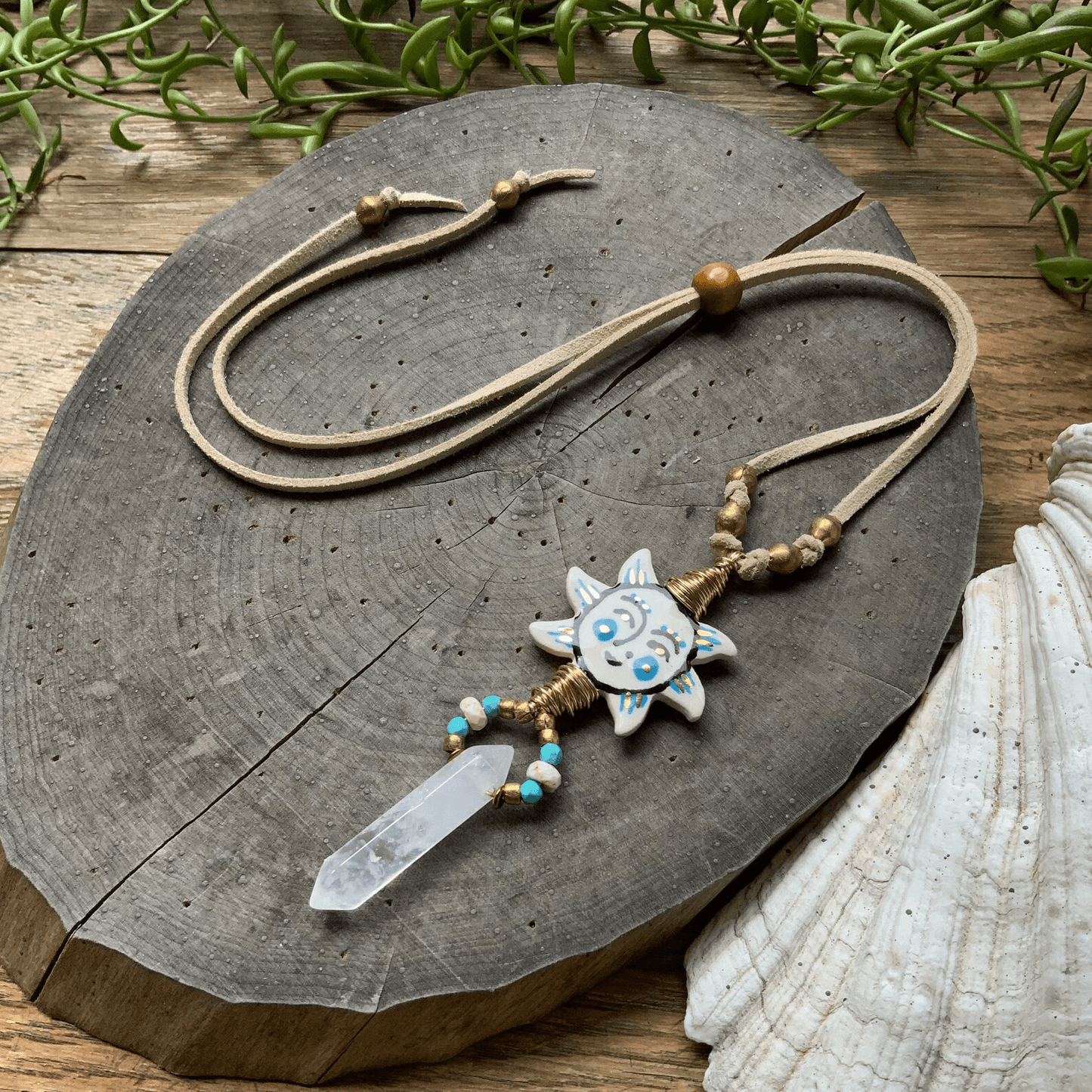Folk art ceramic Sun and Crystal point necklace on beige vegan suede cord