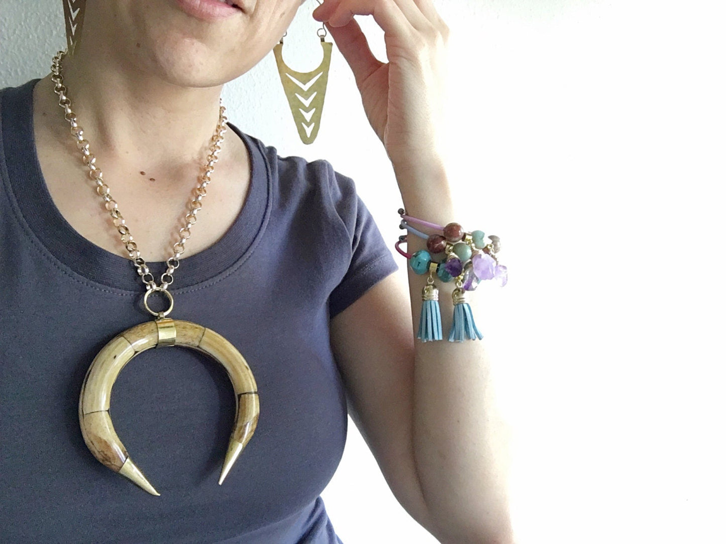 La Fletcha hoop earrings, metalwork arrow hoops, geometric jewelry, sculptural earrings