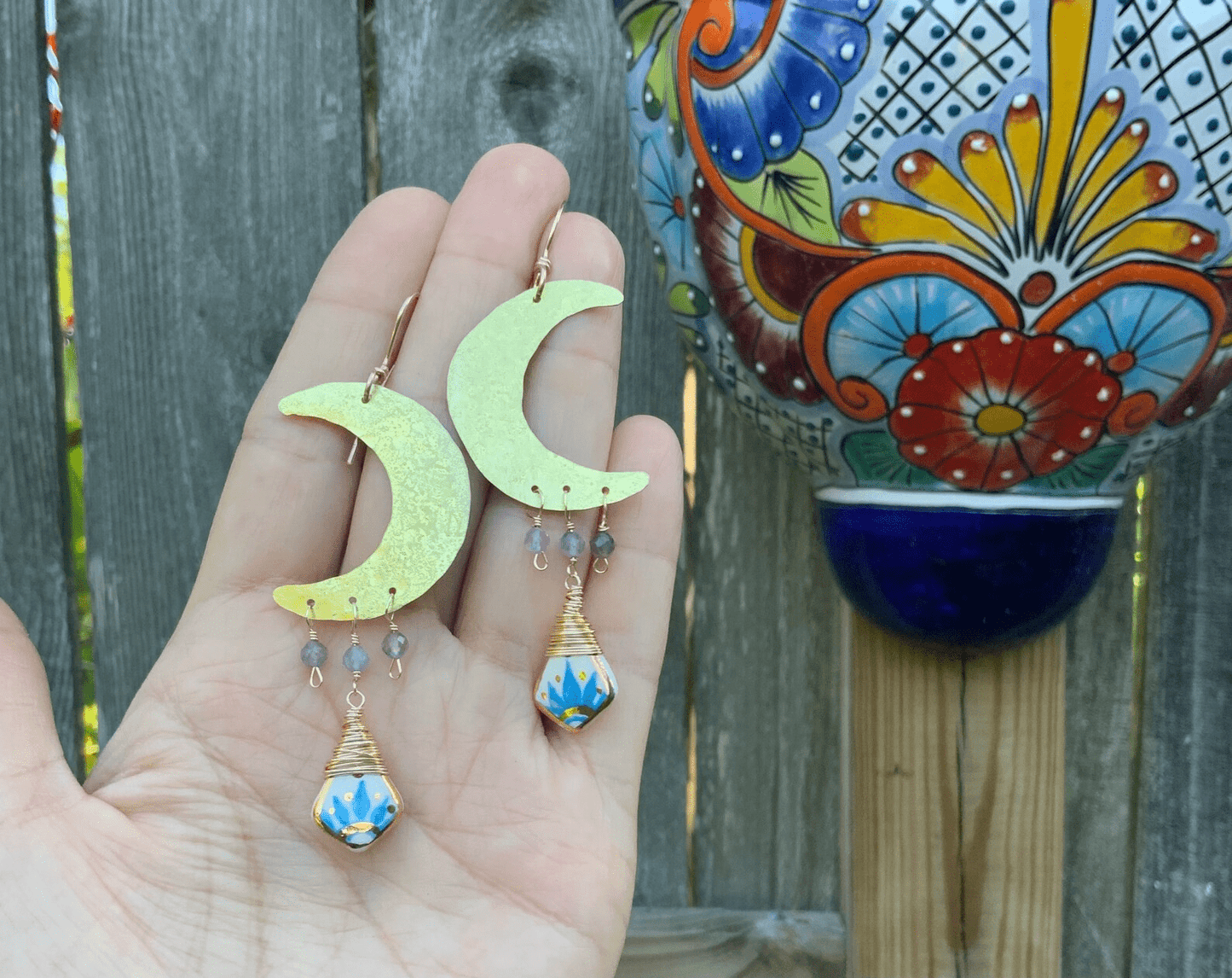Brass moon and folk ceramic drop earrings