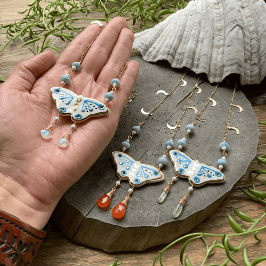 Celestial ceramic moth and larimar necklace