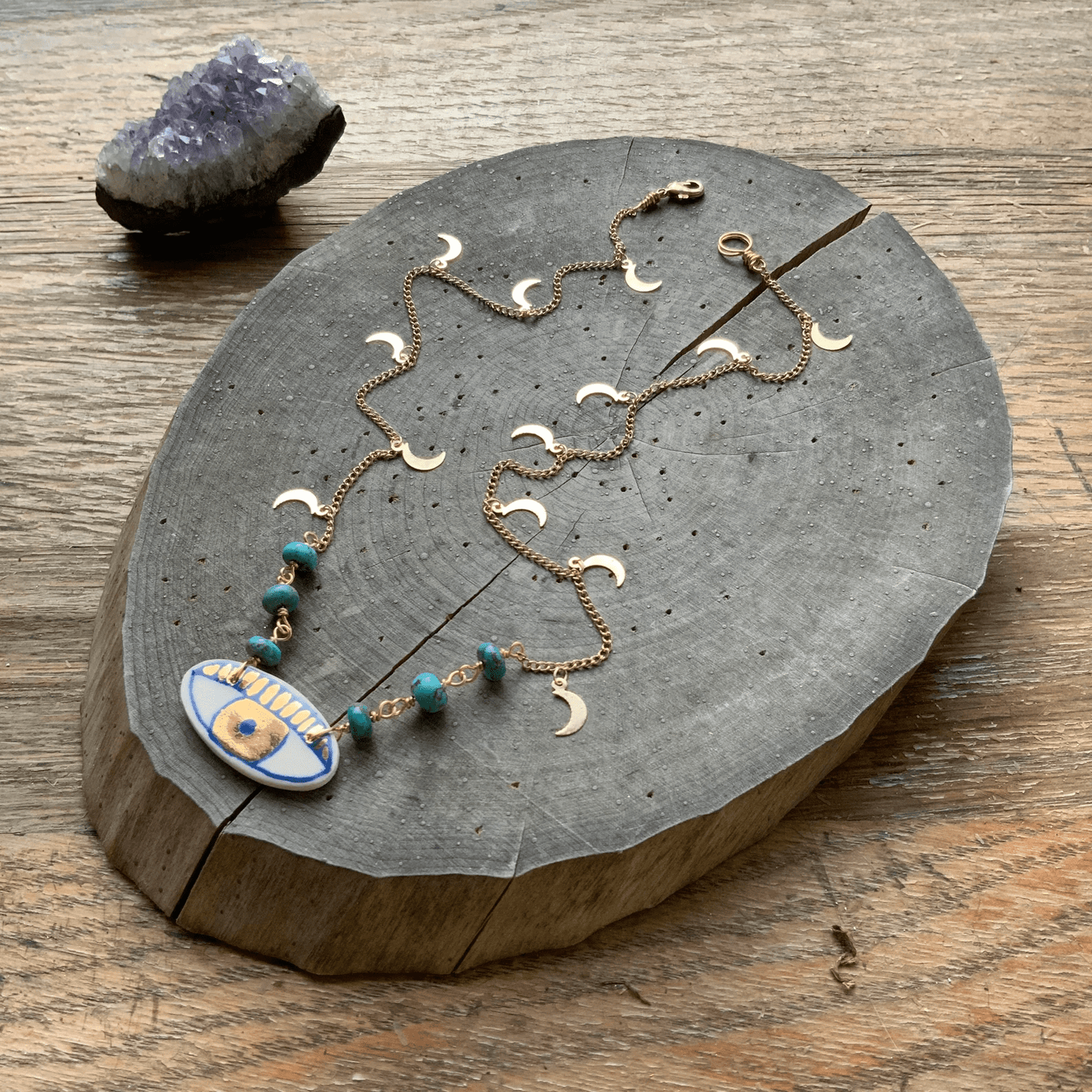 Ceramic indigo eye and crescent moon pendant necklace