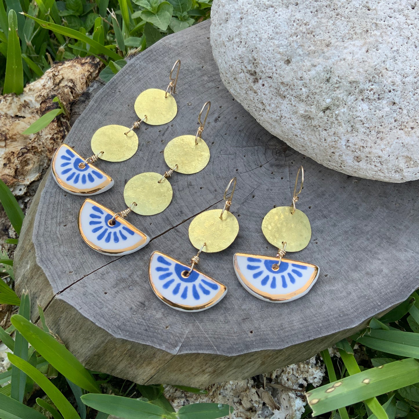 Ceramic indigo flower and hammered brass coin earrings