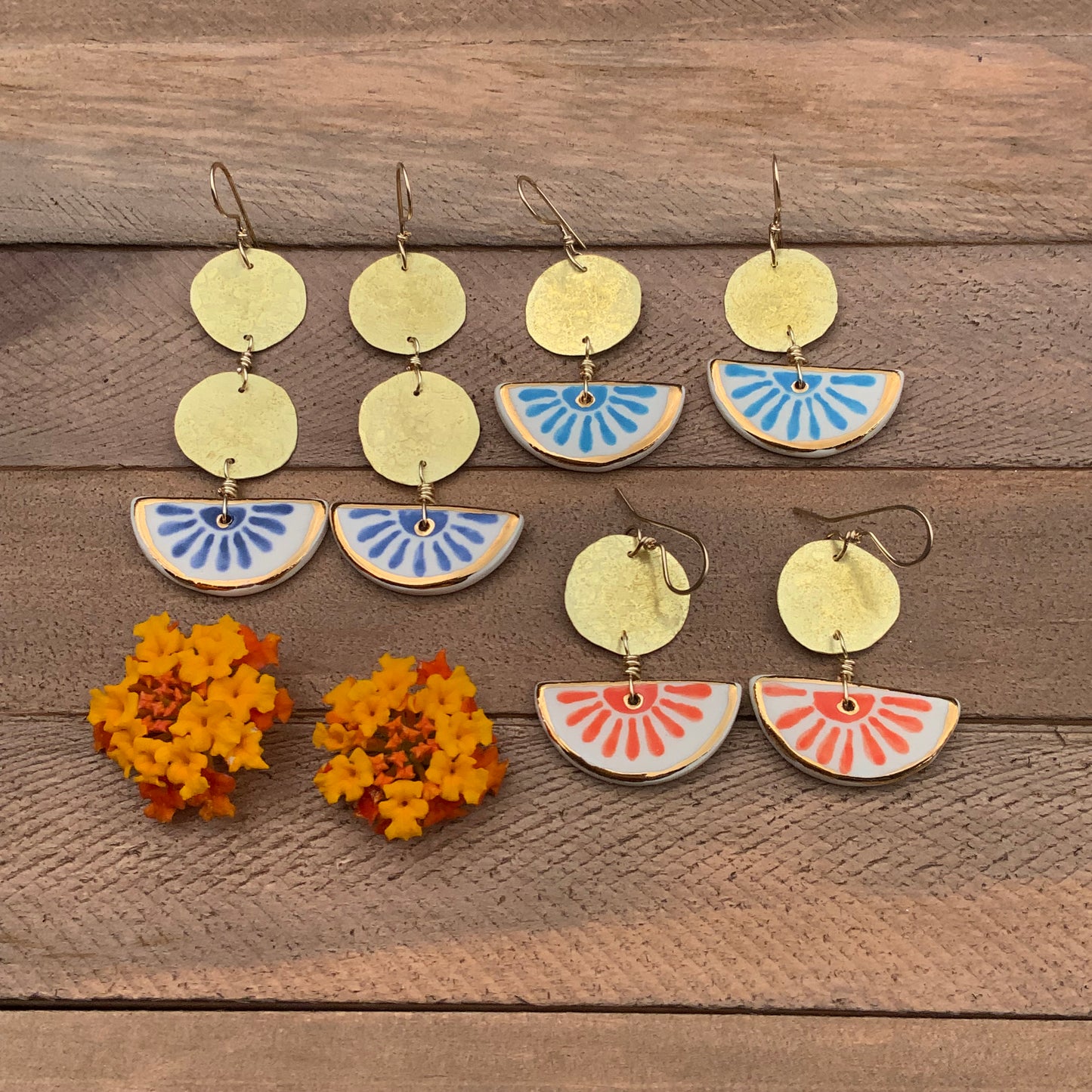 Ceramic indigo flower and hammered brass coin earrings
