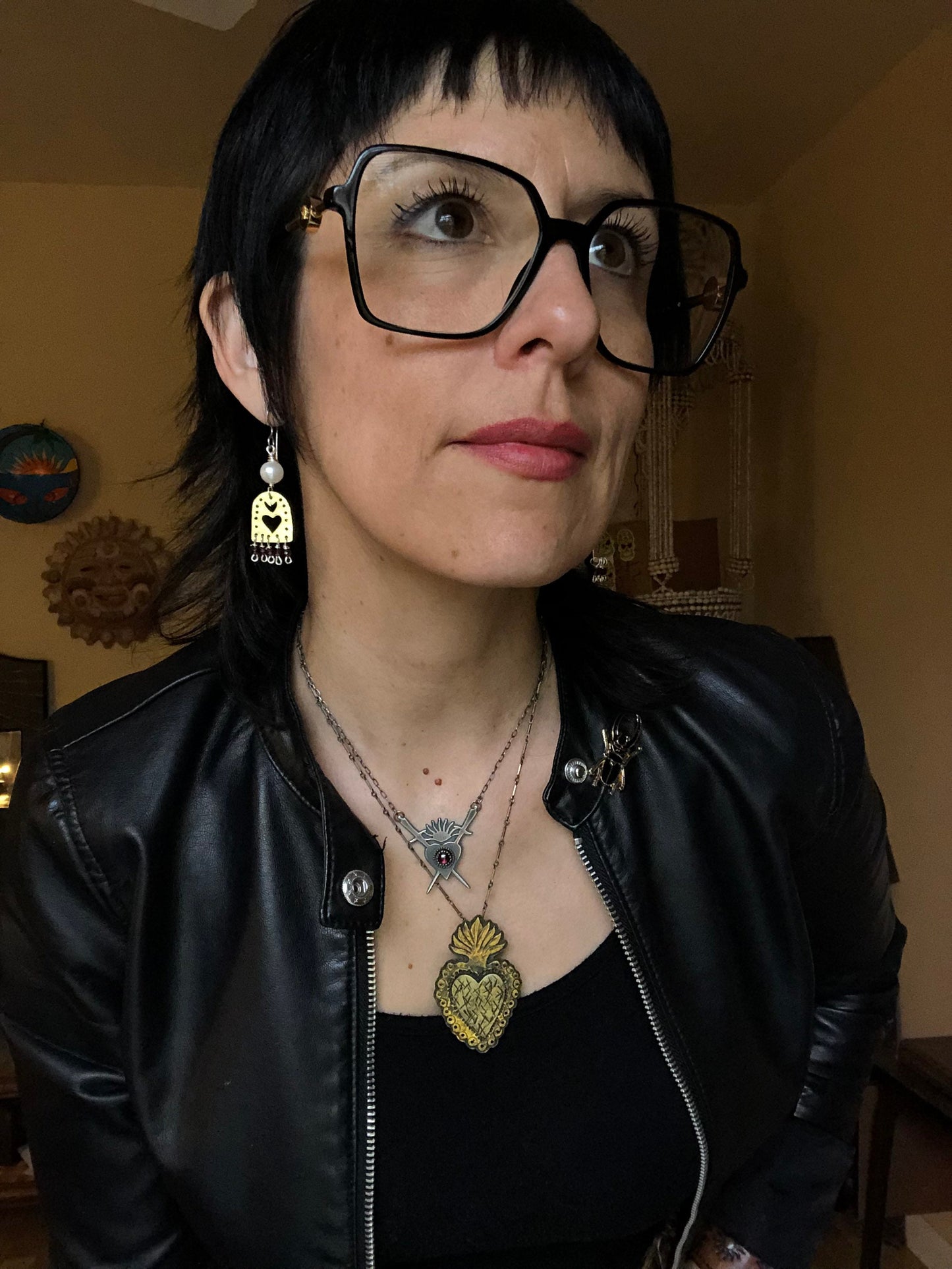 Sacred Heart and garnet dangle earrings, hammered brass Sagrado Corazon earrings