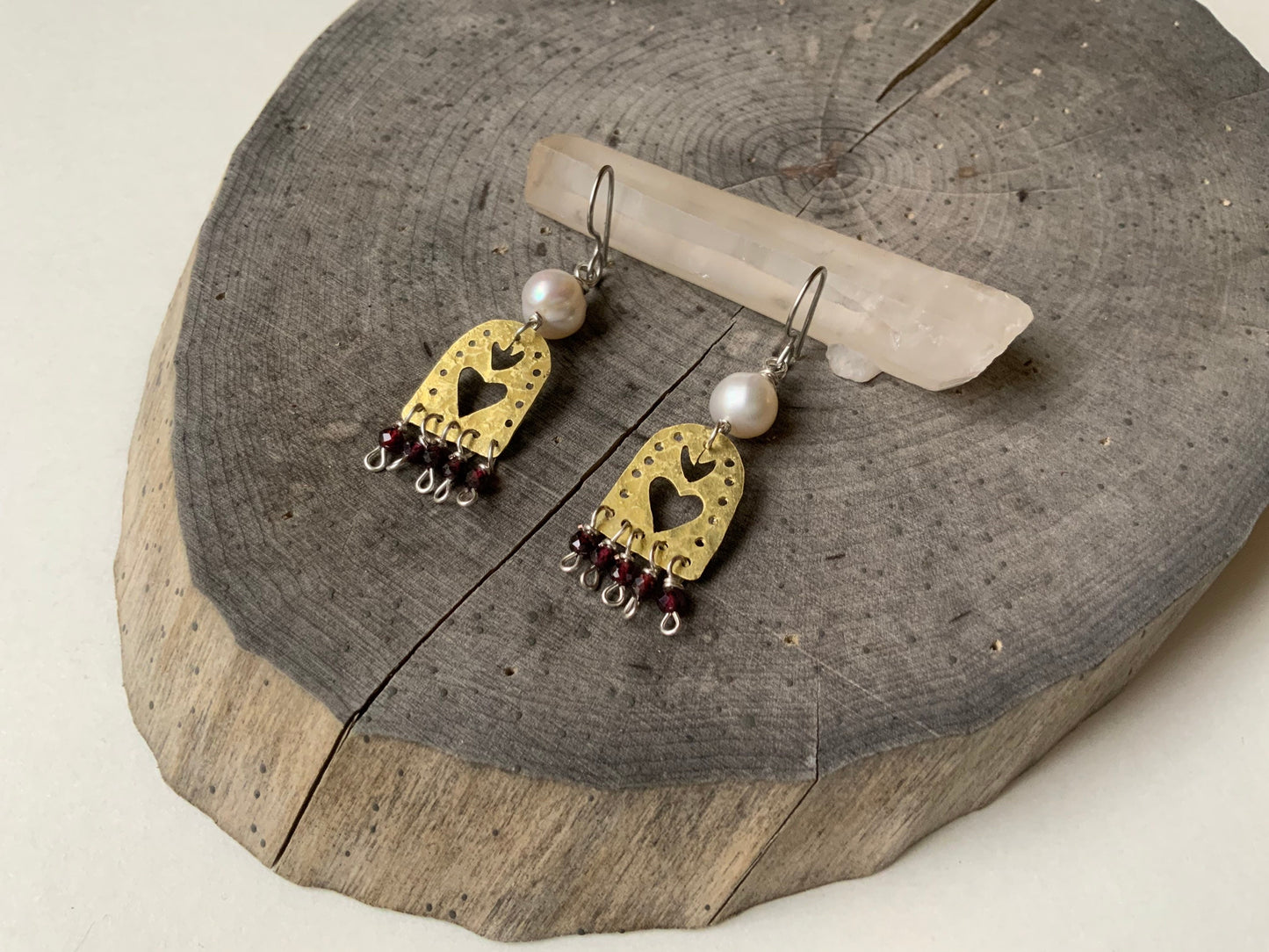Sacred Heart and garnet dangle earrings, hammered brass Sagrado Corazon earrings