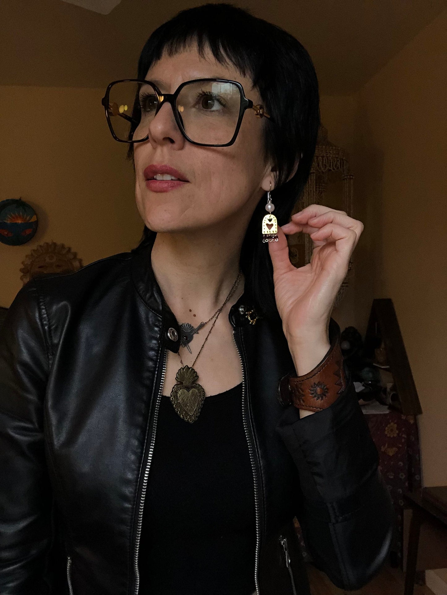 Sacred Heart and garnet dangle earrings, hammered brass Sagrado Corazon earrings