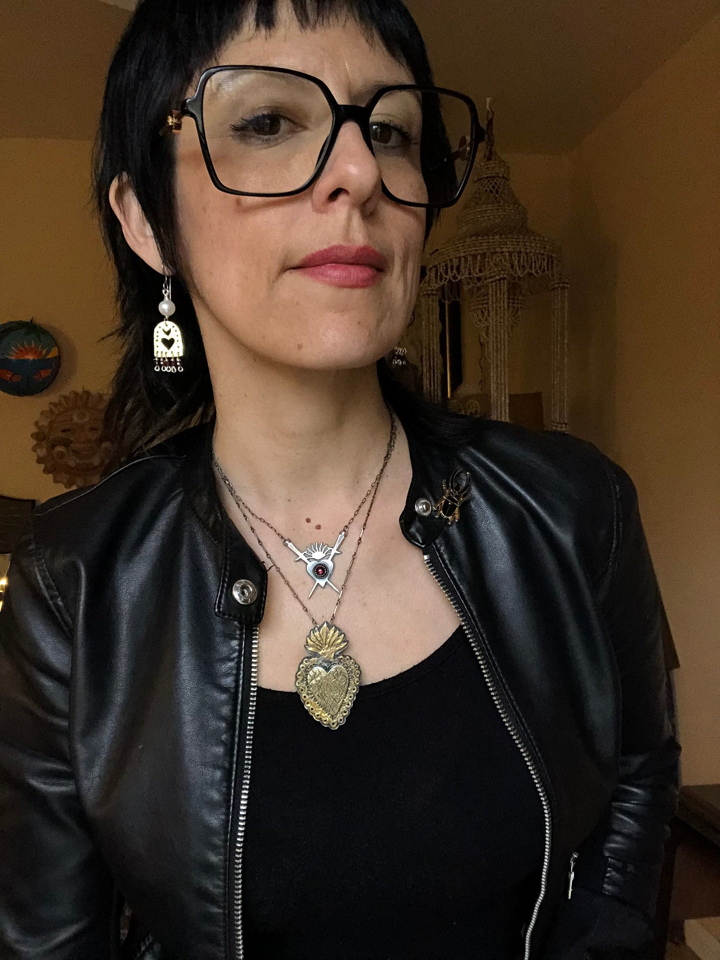 Sacred Heart and garnet dangle earrings, hammered brass Sagrado Corazon earrings