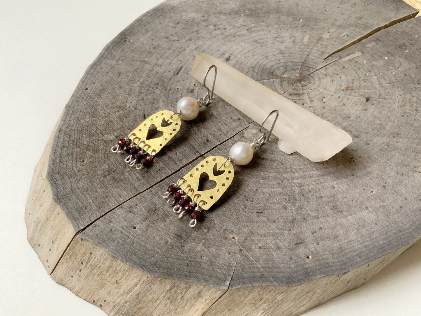 Sacred Heart and garnet dangle earrings, hammered brass Sagrado Corazon earrings
